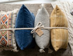 Modern sofa styled with a matching multi-pack of textured couch pillows.